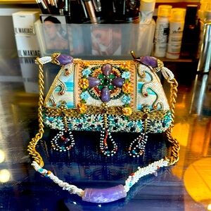 Mary Frances hand beaded and suede 👛 purse.